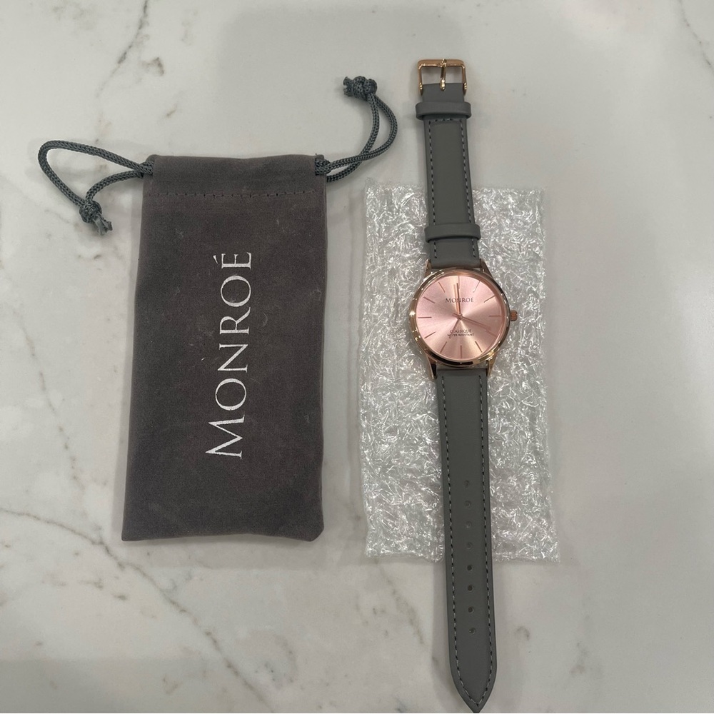 NWOT Monroé rose gold face and grey leather band watch
